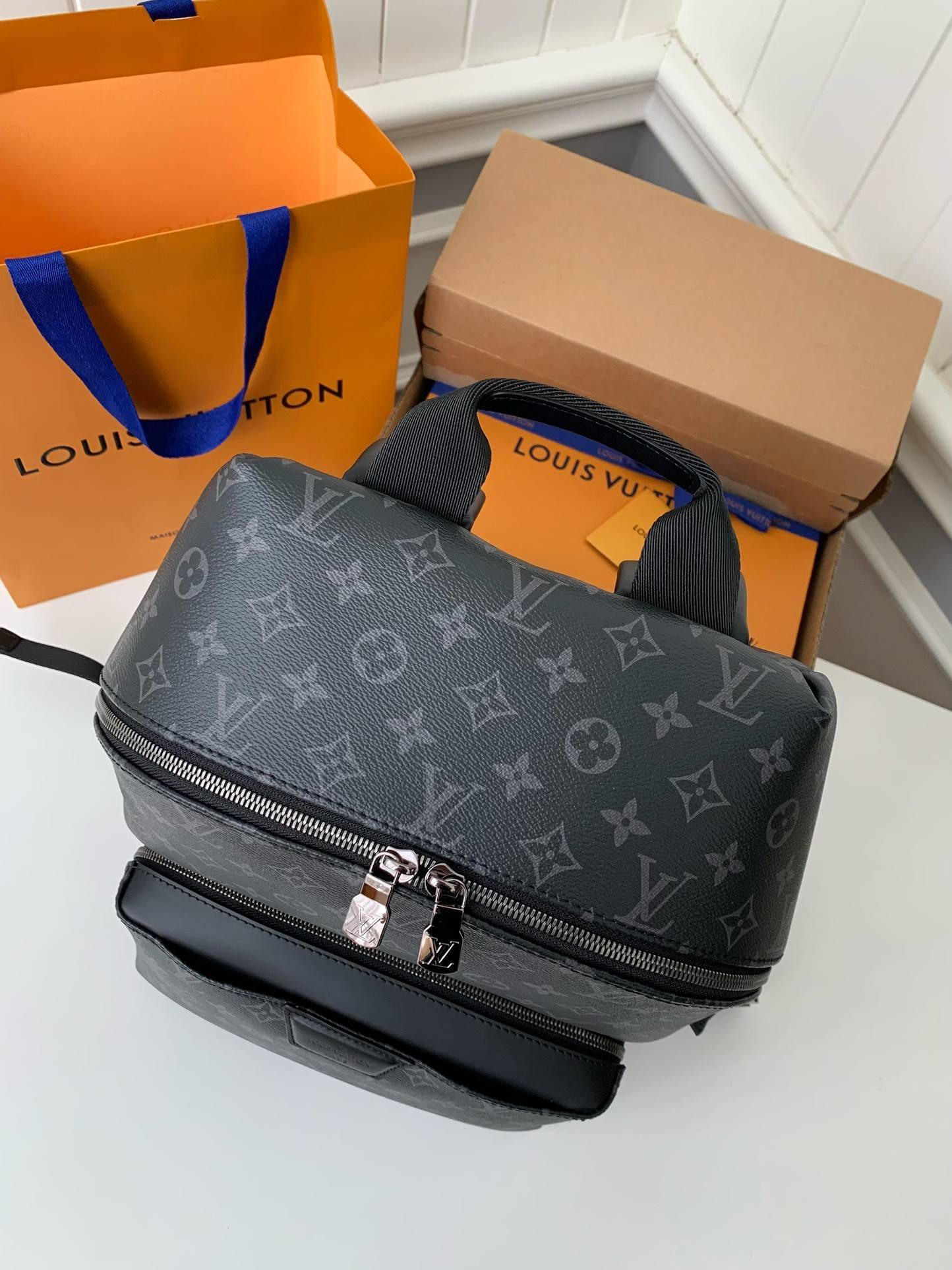 L*V Men's DISCOVERY Black Flower Backpack M43186 Top Quality Size: 30 * 40 * 20cm